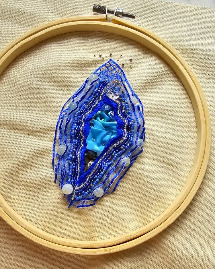 Natural wooden embroidery hoop with silver-tone hardware (ready to hang or display on a shelf).
Craftsmanship: 100% handmade mixed-media textile artwork.