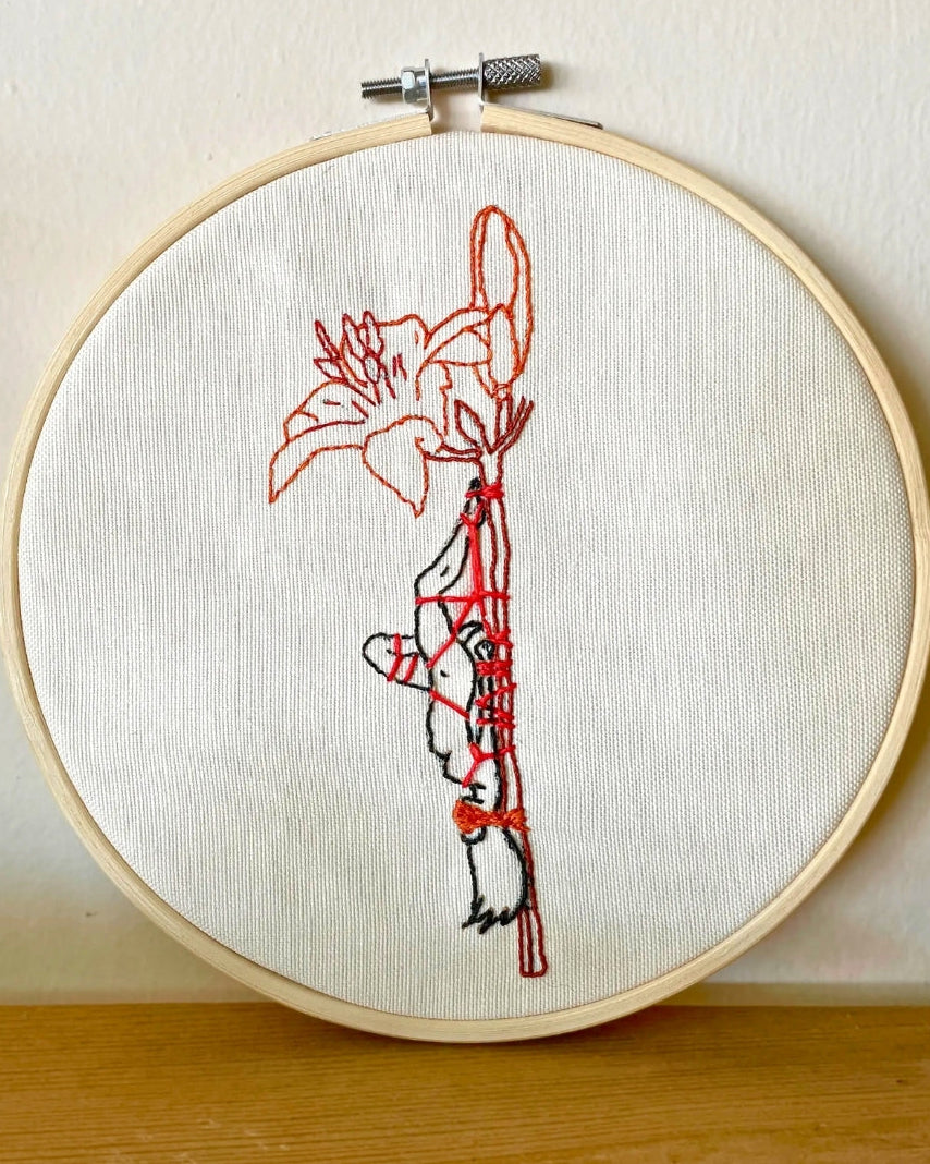 Our fiber art hoop is more than just a stitch. It’s a moment of surrender captured with actual shibari friction ties. Crafted for those who love the contrast of delicate beauty and sweet, tight control. Your walls called; they want some of this.
