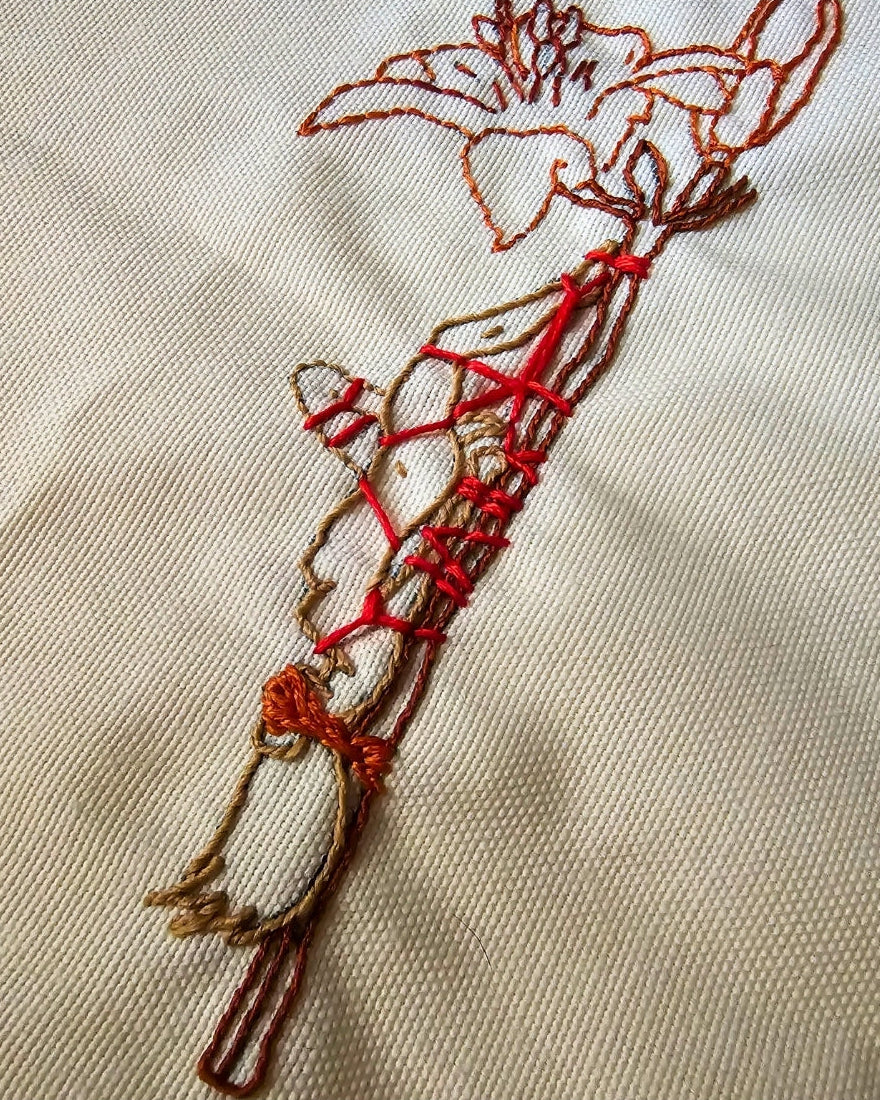 Our fiber art hoop is more than just a stitch. It’s a moment of surrender captured with actual shibari friction ties. Crafted for those who love the contrast of delicate beauty and sweet, tight control. Your walls called; they want some of this.