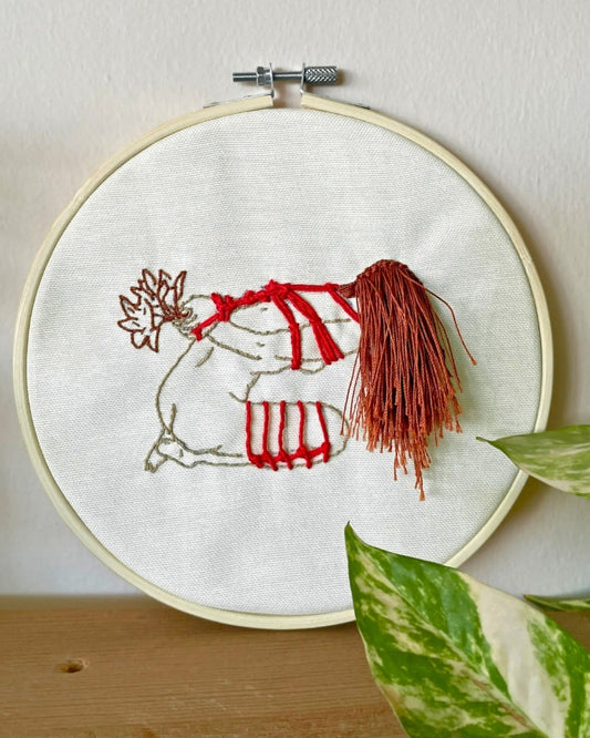Using authentic shibari friction techniques, we’ve carefully bound this silhouette in vibrant red ropes. It’s a study in tension, surrender, and the beautiful lines the body creates when it’s held just right.